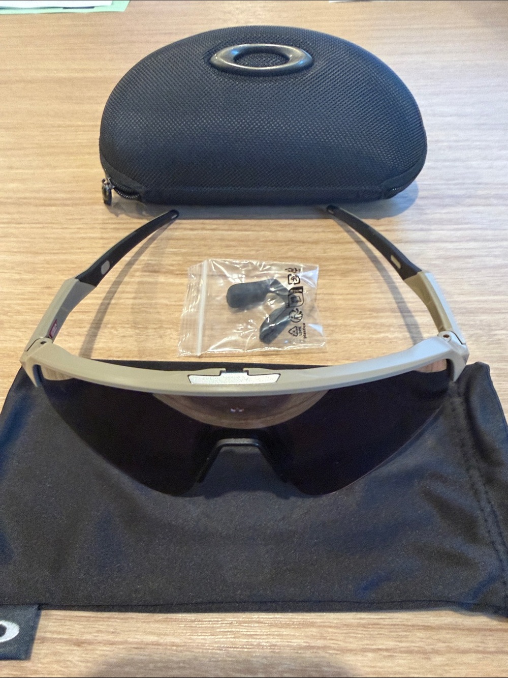 Oakley Sunglasses Matte Tan Frame with Black Lenses Brand new never been worn